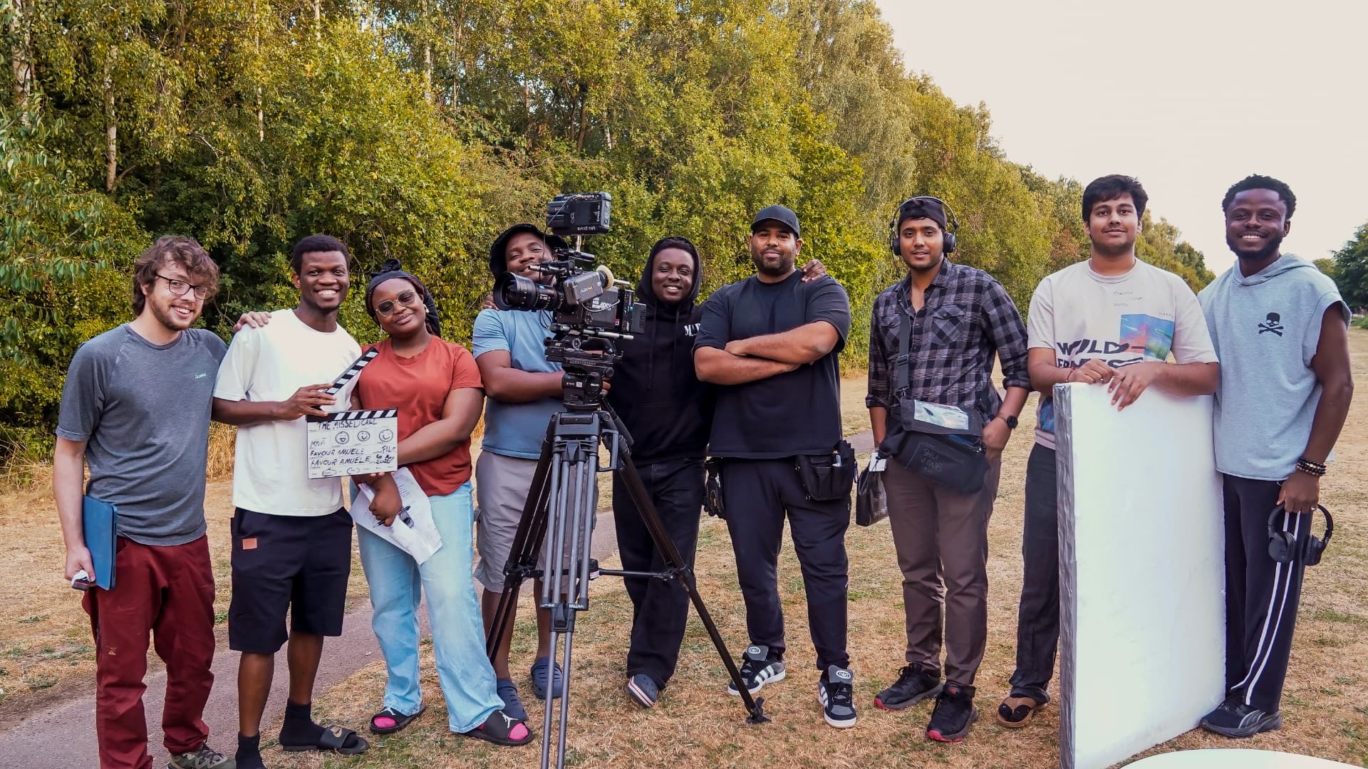 Favour Amuele with a film crew and cinema camera on location